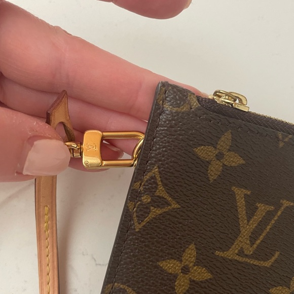 Authentic LV Neverfull pouch. Clean inside no rips or tears. Barely used. - Picture 3 of 7